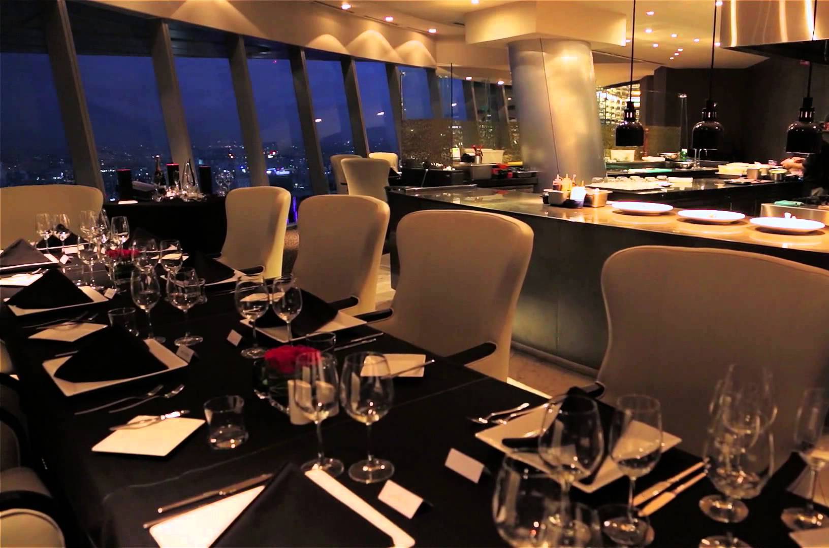 image of restaurant looking out into the skyline in the evening